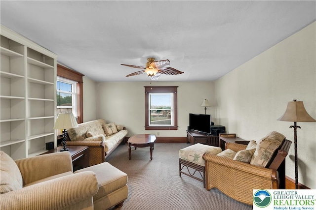 14 S 14th St, Easton, PA 18042 - living area with carpet floors, plenty of natural light, and a ceiling fan