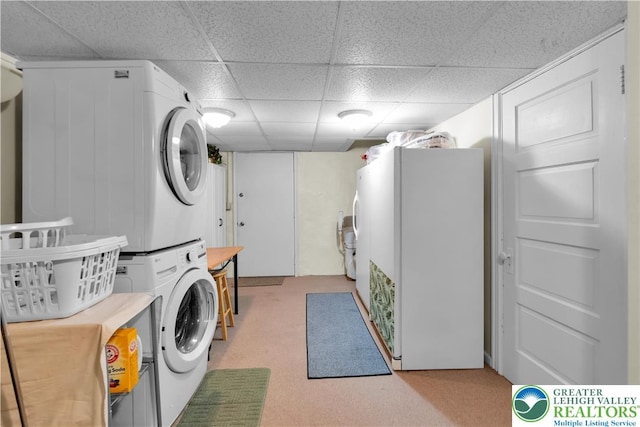 14 S 14th St, Easton, PA 18042 - washroom with stacked washing machine and dryer and light carpet