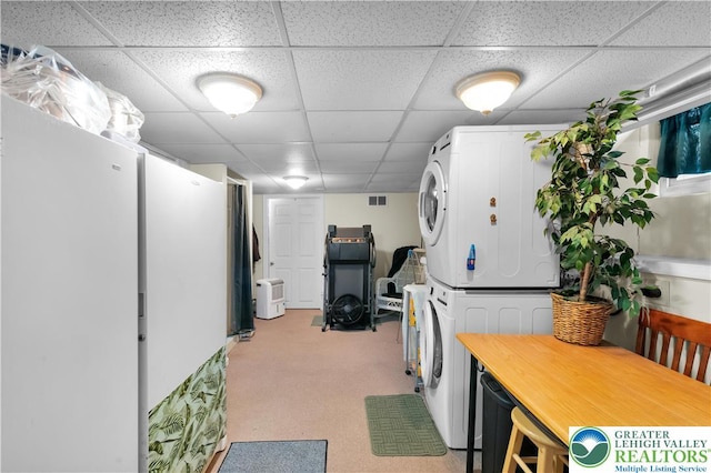 14 S 14th St, Easton, PA 18042 - laundry area with stacked washer / dryer and light colored carpet
