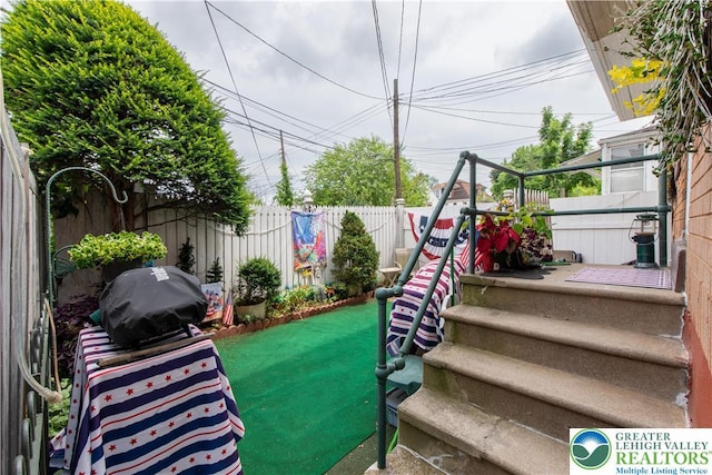 14 S 14th St, Easton, PA 18042 - fenced backyard with a grill