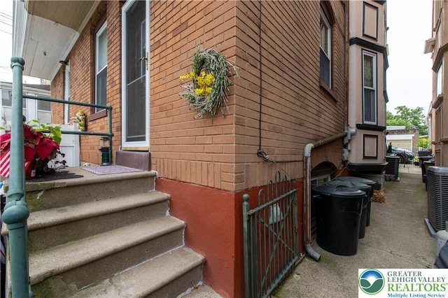 14 S 14th St, Easton, PA 18042 - view of property exterior with brick siding and a cooling unit