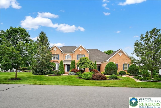4508 Homestead Dr, Lower Nazareth Twp, PA 18064 - colonial home featuring a front yard and brick siding