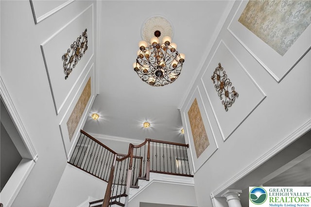 4508 Homestead Dr, Lower Nazareth Twp, PA 18064 - stairway featuring a towering ceiling and a chandelier