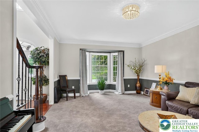 4508 Homestead Dr, Lower Nazareth Twp, PA 18064 - carpeted living room featuring ornamental molding, stairs, and a chandelier