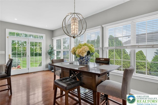 4508 Homestead Dr, Lower Nazareth Twp, PA 18064 - dining room with plenty of natural light, a chandelier, wood finished floors, and recessed lighting