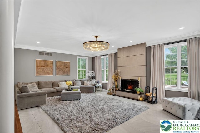 4508 Homestead Dr, Lower Nazareth Twp, PA 18064 - living room featuring ornamental molding, a chandelier, a fireplace, and recessed lighting