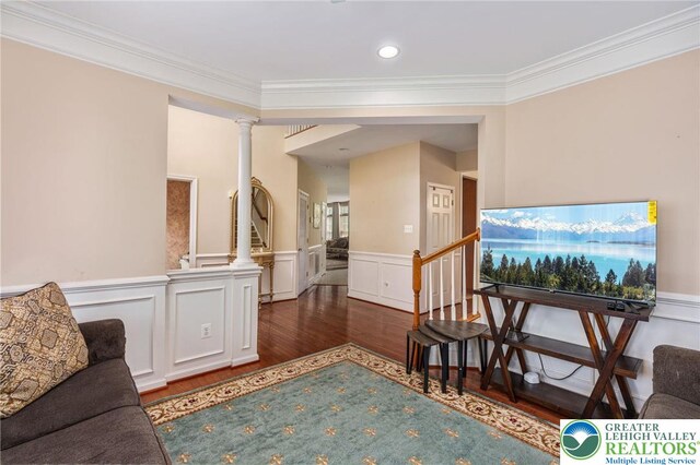 232 S 33rd St, South Whitehall Twp, PA 18104 - living area featuring ornate columns, wood finished floors, ornamental molding, wainscoting, and stairway