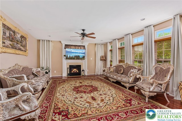 232 S 33rd St, South Whitehall Twp, PA 18104 - living room with ceiling fan, wood finished floors, and a glass covered fireplace
