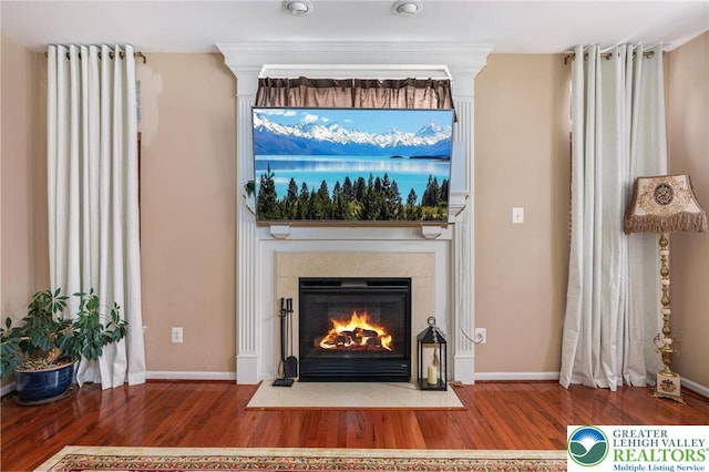 232 S 33rd St, South Whitehall Twp, PA 18104 - detailed view of wood finished floors and a fireplace with flush hearth
