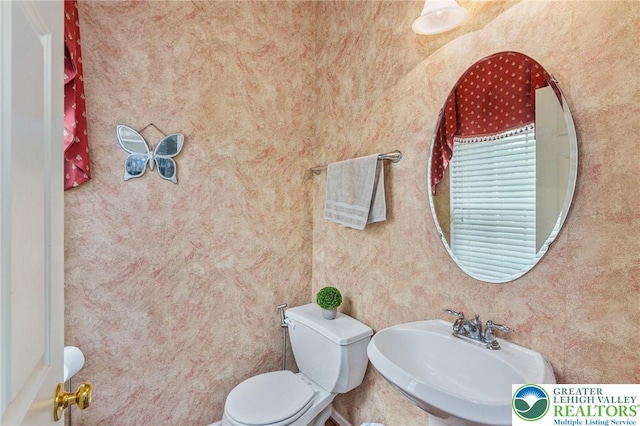 232 S 33rd St, South Whitehall Twp, PA 18104 - half bath featuring a sink and toilet