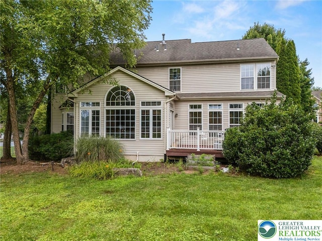 232 S 33rd St, South Whitehall Twp, PA 18104 - rear view of house featuring a wooden deck and a yard