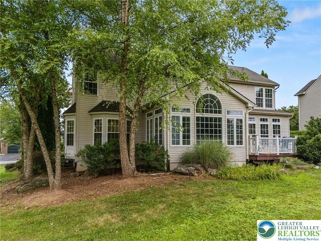 232 S 33rd St, South Whitehall Twp, PA 18104 - rear view of house featuring a yard and a deck