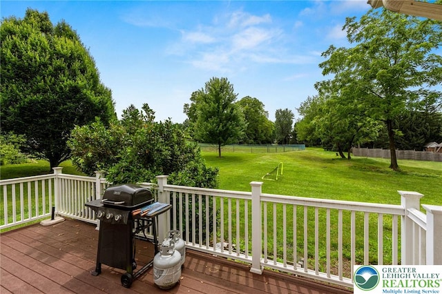 232 S 33rd St, South Whitehall Twp, PA 18104 - wooden terrace with grilling area and a yard