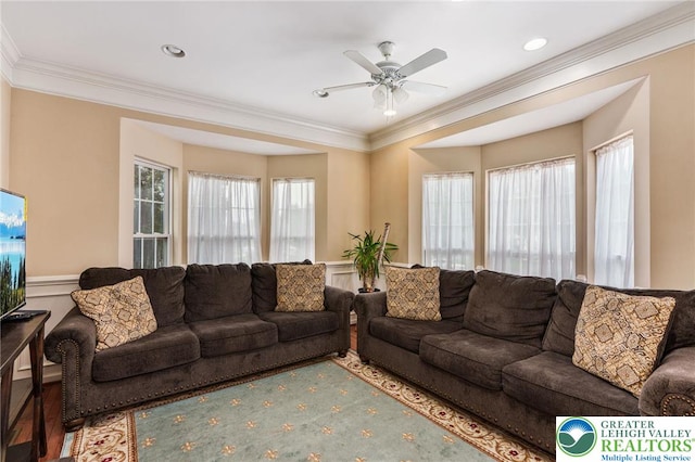 232 S 33rd St, South Whitehall Twp, PA 18104 - living room with plenty of natural light, crown molding, a wainscoted wall, and a ceiling fan