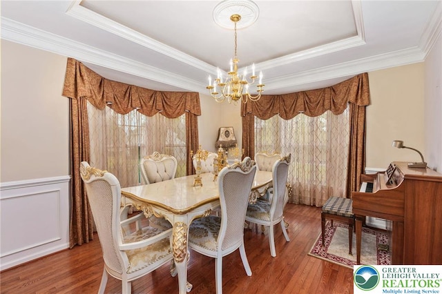 232 S 33rd St, South Whitehall Twp, PA 18104 - dining space featuring a chandelier, ornamental molding, wood finished floors, and a tray ceiling