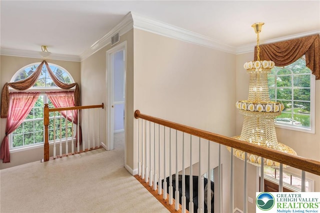 232 S 33rd St, South Whitehall Twp, PA 18104 - hall with an upstairs landing, a chandelier, crown molding, and carpet flooring