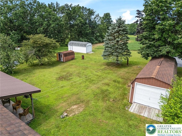 7438 Rte 309, Lynn Twp, PA 18066 - view of green lawn featuring a shed and a detached garage