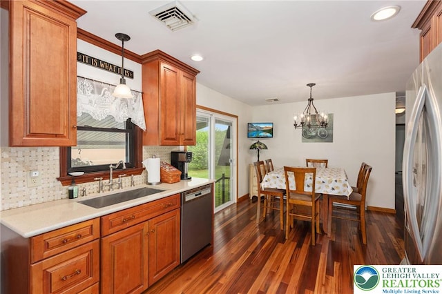 7438 Rte 309, Lynn Twp, PA 18066 - kitchen with appliances with stainless steel finishes, backsplash, brown cabinets, light countertops, and recessed lighting