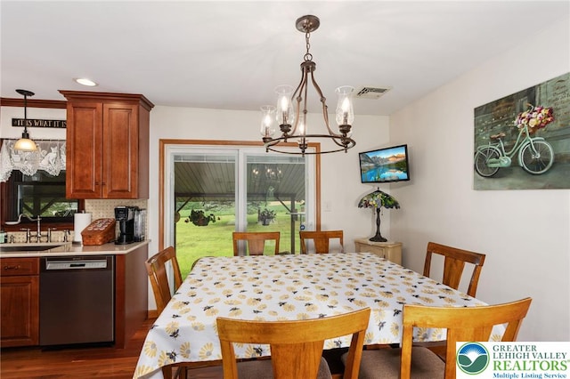 7438 Rte 309, Lynn Twp, PA 18066 - dining space with a chandelier and dark wood finished floors
