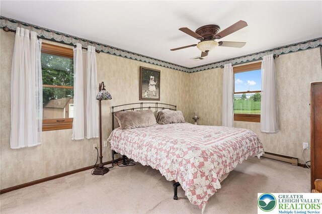 7438 Rte 309, Lynn Twp, PA 18066 - carpeted bedroom with ceiling fan and baseboard heating