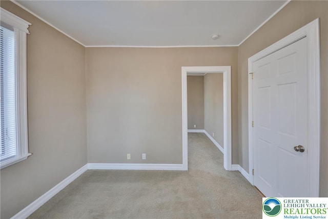 5758 Lower Macungie Rd, Lower Macungie Twp, PA 18062 - spare room featuring light carpet and crown molding