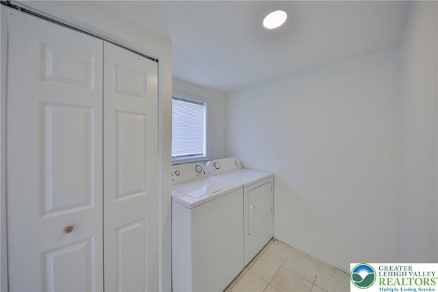 5758 Lower Macungie Rd, Lower Macungie Twp, PA 18062 - laundry room with separate washer and dryer and light tile patterned floors