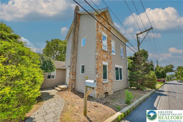 5758 Lower Macungie Rd, Lower Macungie Twp, PA 18062 - view of home's exterior with stone siding