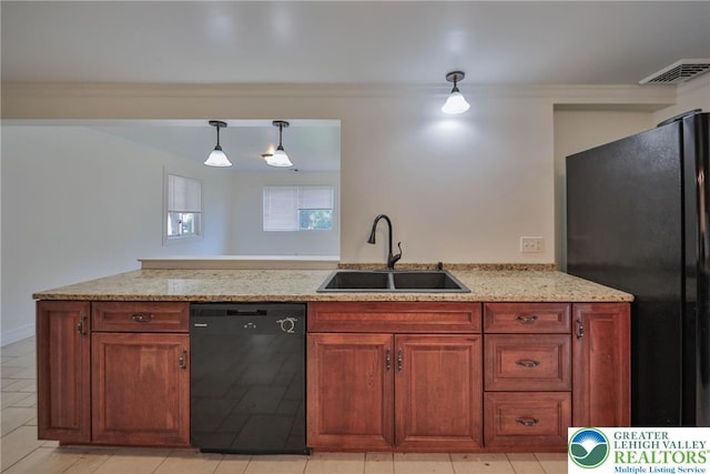 5758 Lower Macungie Rd, Lower Macungie Twp, PA 18062 - kitchen featuring black appliances, a peninsula, light stone countertops, decorative light fixtures, and ornamental molding