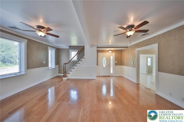 5758 Lower Macungie Rd, Lower Macungie Twp, PA 18062 - foyer entrance with a ceiling fan, stairway, ornamental molding, and light wood-style floors