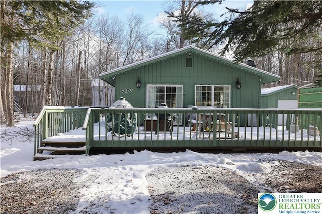 9379 Fairmount, Coolbaugh Twp, PA 18466 - view of front facade with a deck