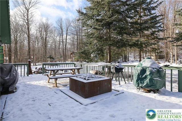 9379 Fairmount, Coolbaugh Twp, PA 18466 - snow covered deck featuring an outdoor fire pit