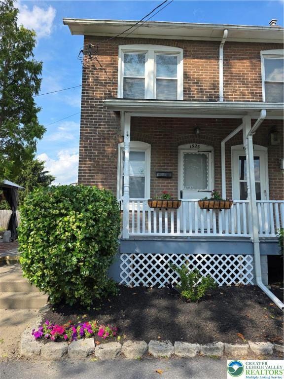 1523 Cedar St, Northampton Boro, PA 18067 - view of front of house with covered porch and brick siding