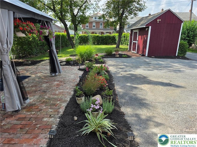 1523 Cedar St, Northampton Boro, PA 18067 - view of patio with a storage unit