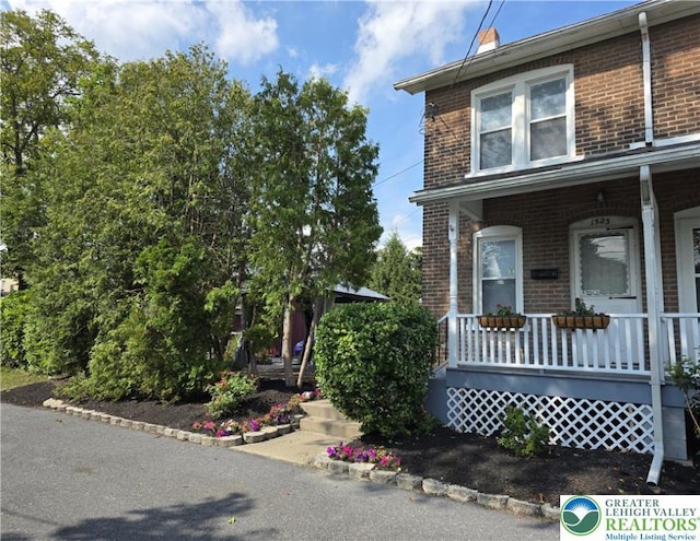 1523 Cedar St, Northampton Boro, PA 18067 - view of front of house featuring covered porch and brick siding