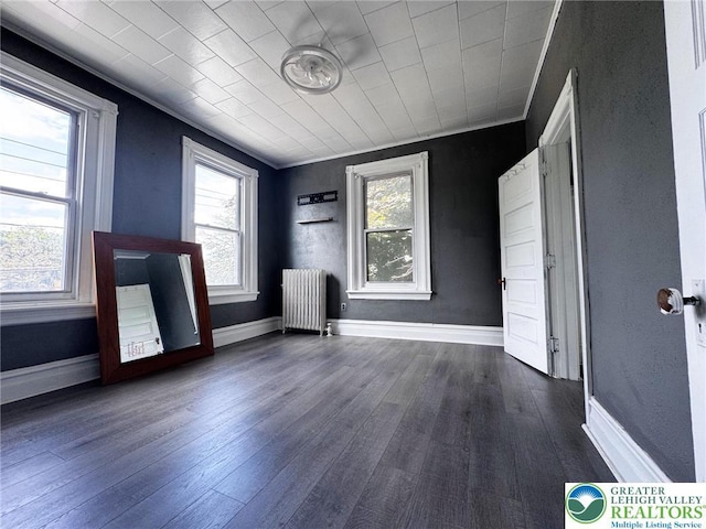 206 21st St, Northampton Boro, PA 18067 - unfurnished bedroom featuring radiator and dark wood-style flooring