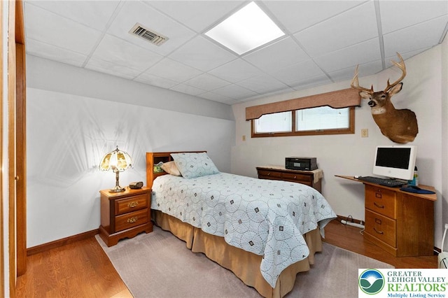4661 Hillside Rd, Coplay Boro, PA 18037 - bedroom with a drop ceiling and light wood-style floors