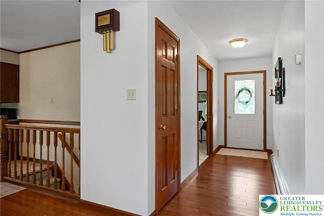 4661 Hillside Rd, Coplay Boro, PA 18037 - doorway featuring baseboard heating and wood finished floors