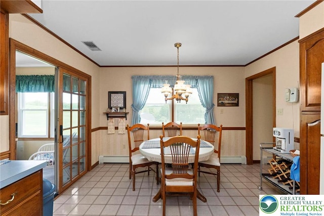 4661 Hillside Rd, Coplay Boro, PA 18037 - dining space with a baseboard heating unit, a chandelier, crown molding, light tile patterned flooring, and french doors