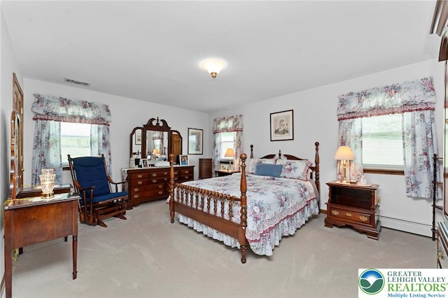 4661 Hillside Rd, Coplay Boro, PA 18037 - carpeted bedroom with baseboard heating and multiple windows