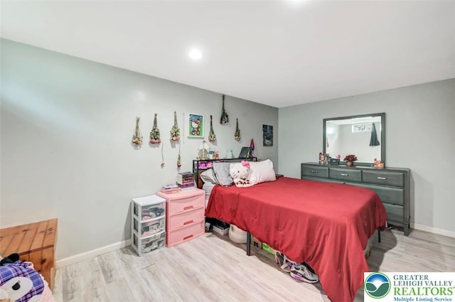 5117 Hounds Ear Rd, Coolbaugh Twp, PA 18466 - bedroom featuring light wood finished floors