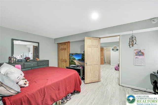 5117 Hounds Ear Rd, Coolbaugh Twp, PA 18466 - bedroom with light wood-style flooring