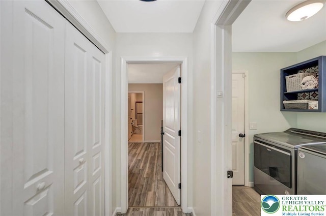5117 Hounds Ear Rd, Coolbaugh Twp, PA 18466 - hallway with washer and dryer and wood finished floors