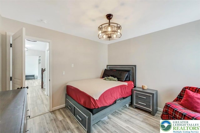 5117 Hounds Ear Rd, Coolbaugh Twp, PA 18466 - bedroom with light wood finished floors and baseboards