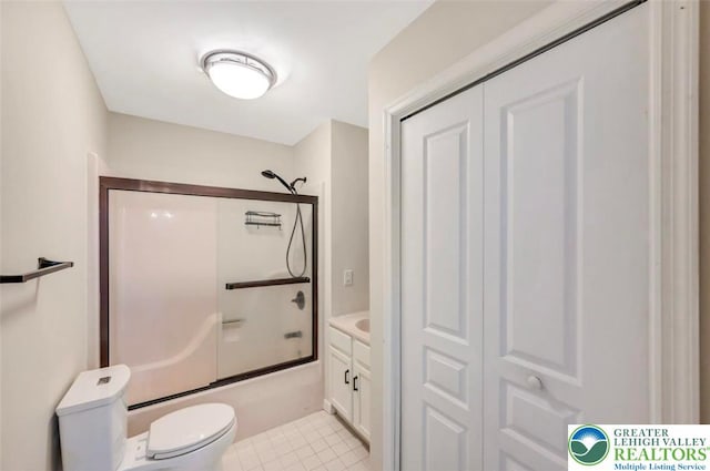 5117 Hounds Ear Rd, Coolbaugh Twp, PA 18466 - bathroom with shower / bath combination with glass door, tile patterned flooring, and a closet