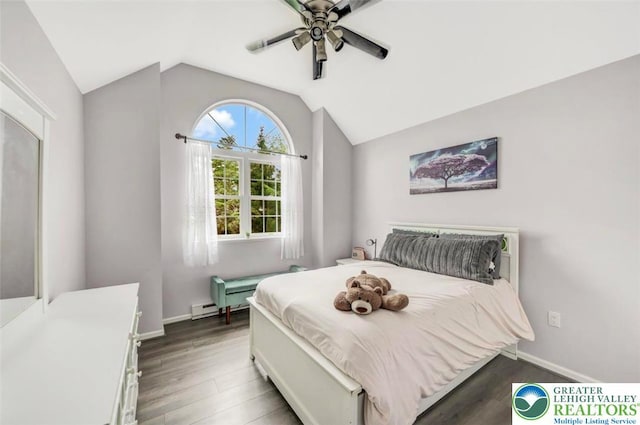 5117 Hounds Ear Rd, Coolbaugh Twp, PA 18466 - bedroom featuring wood finished floors, vaulted ceiling, a ceiling fan, and baseboard heating