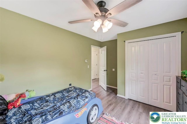5117 Hounds Ear Rd, Coolbaugh Twp, PA 18466 - bedroom featuring light wood-style floors, a closet, and ceiling fan