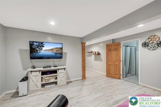 5117 Hounds Ear Rd, Coolbaugh Twp, PA 18466 - living room with light wood-style flooring and recessed lighting