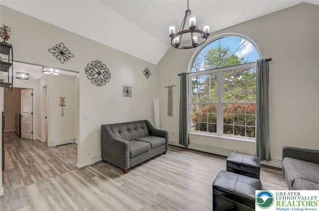 5117 Hounds Ear Rd, Coolbaugh Twp, PA 18466 - living room featuring a chandelier, a baseboard radiator, light wood-style flooring, and high vaulted ceiling