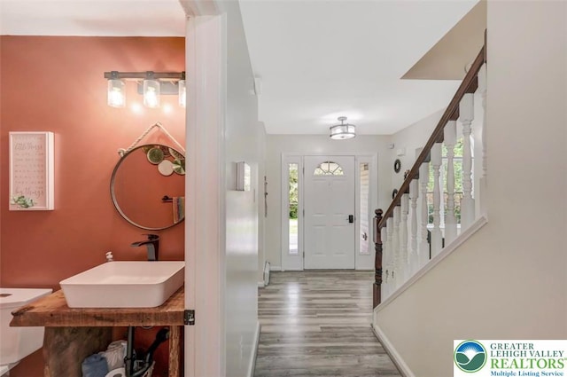 5117 Hounds Ear Rd, Coolbaugh Twp, PA 18466 - foyer entrance featuring stairway and wood finished floors