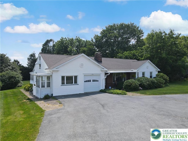 2930 Green Pond, Palmer Twp, PA 18045 - view of front of property featuring an attached garage, driveway, a front yard, and a chimney